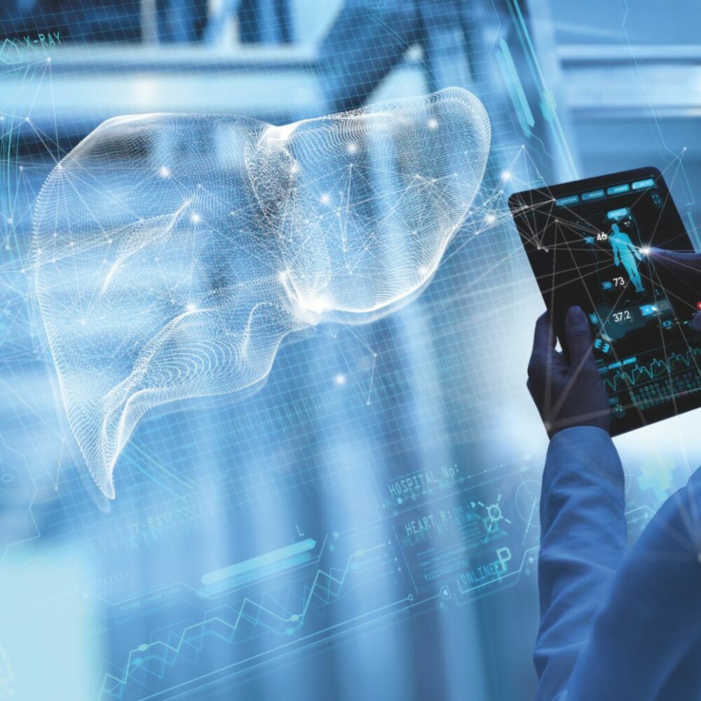 Images shows a doctor touching a digital medical record tablet with augmented reality liver.